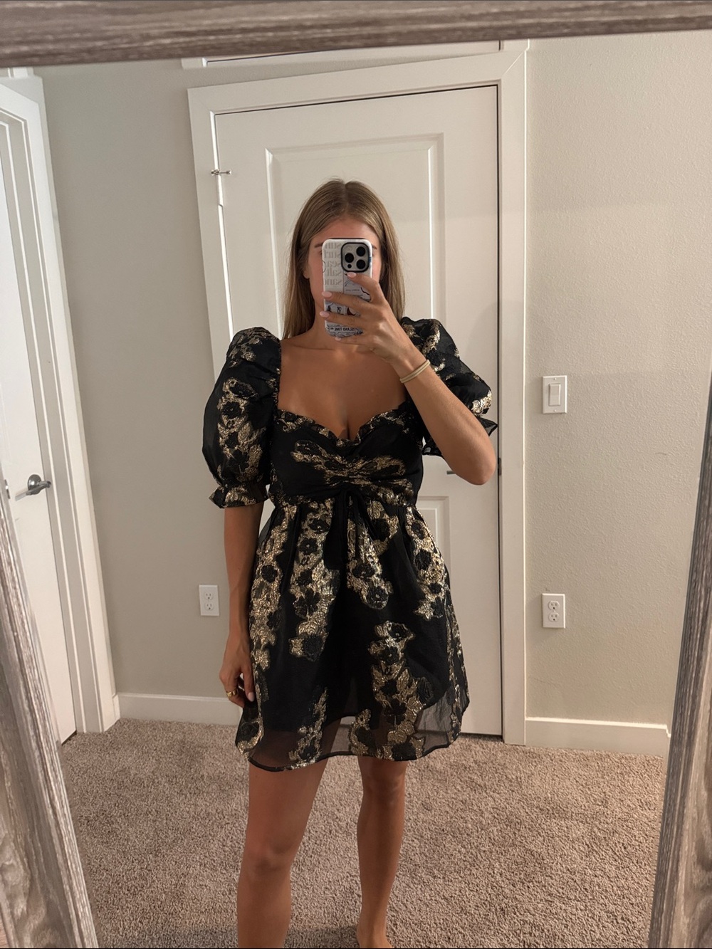 Buddy love, black and gold dress